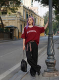 DAXUEN solid navy blue oversized arched text graphic t-shirt — model photo