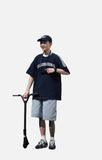DAXUEN solid navy blue oversized arched text graphic t-shirt