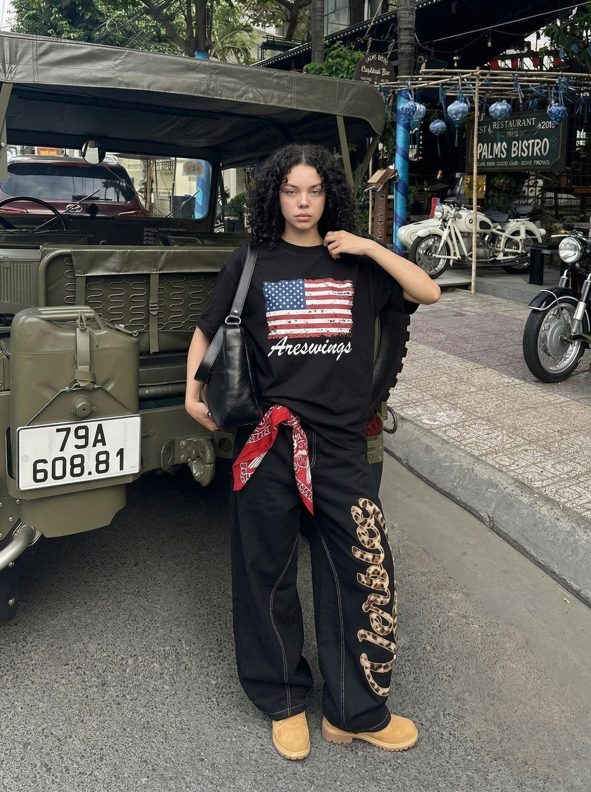 DAXUEN Areswings graphic t-shirt with American flag design — model photo