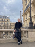 DAXUEN black asymmetric button-up long sleeve top — model photo