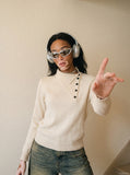 DAXUEN beige knit asymmetric double-layer high collar sweater — model photo