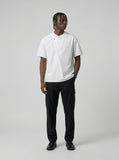 DAXUEN Asymmetrical button detail short-sleeved t-shirt — model photo