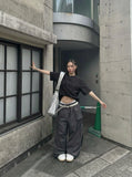 DAXUEN Asymmetrical button detail short-sleeved t-shirt — model photo