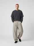 DAXUEN charcoal oversized asymmetrical-button wide-leg trousers — model photo
