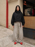DAXUEN charcoal oversized asymmetrical-button wide-leg trousers — model photo