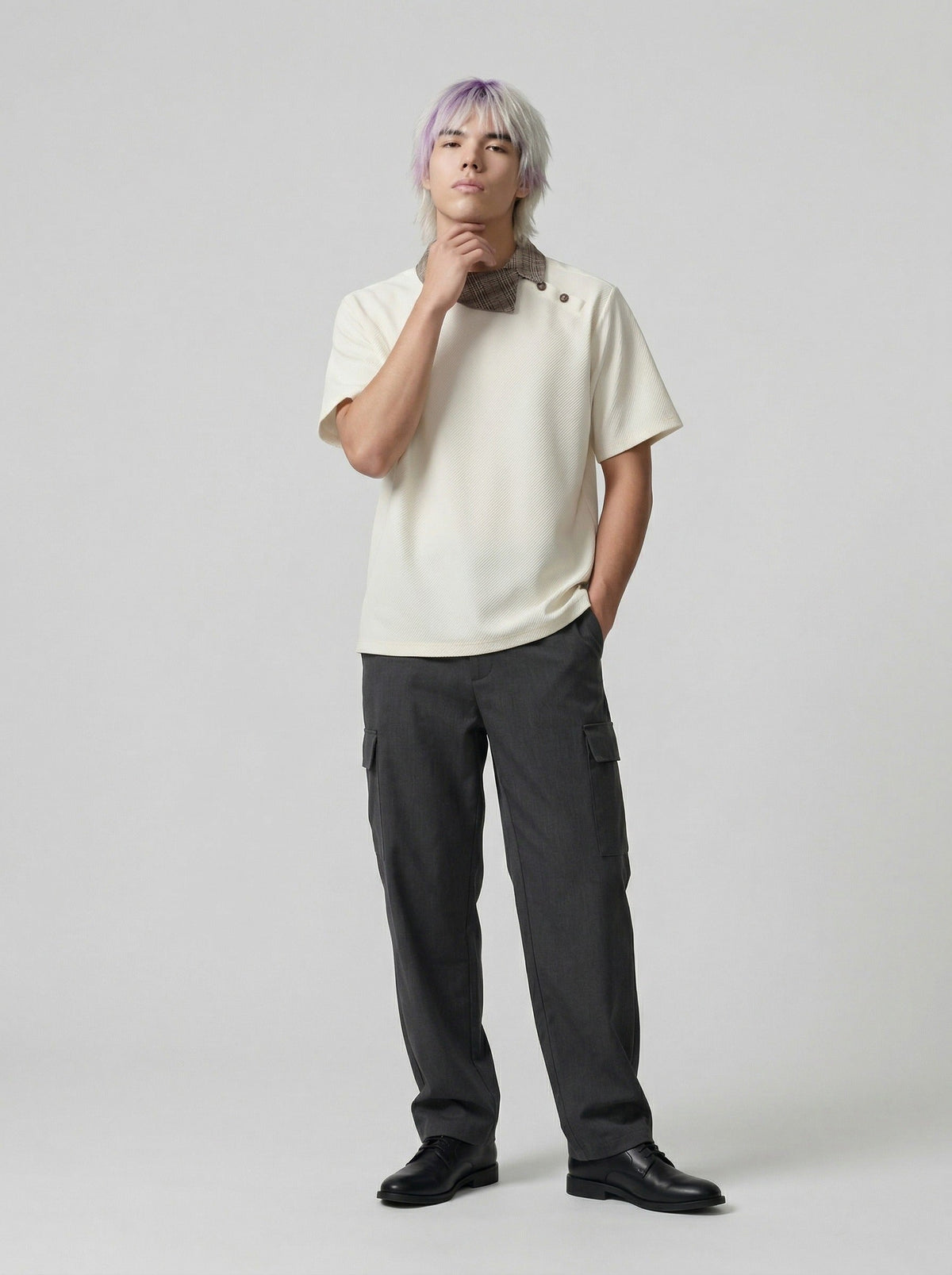 DAXUEN Asymmetrical collar short-sleeve top in cream and black — model photo