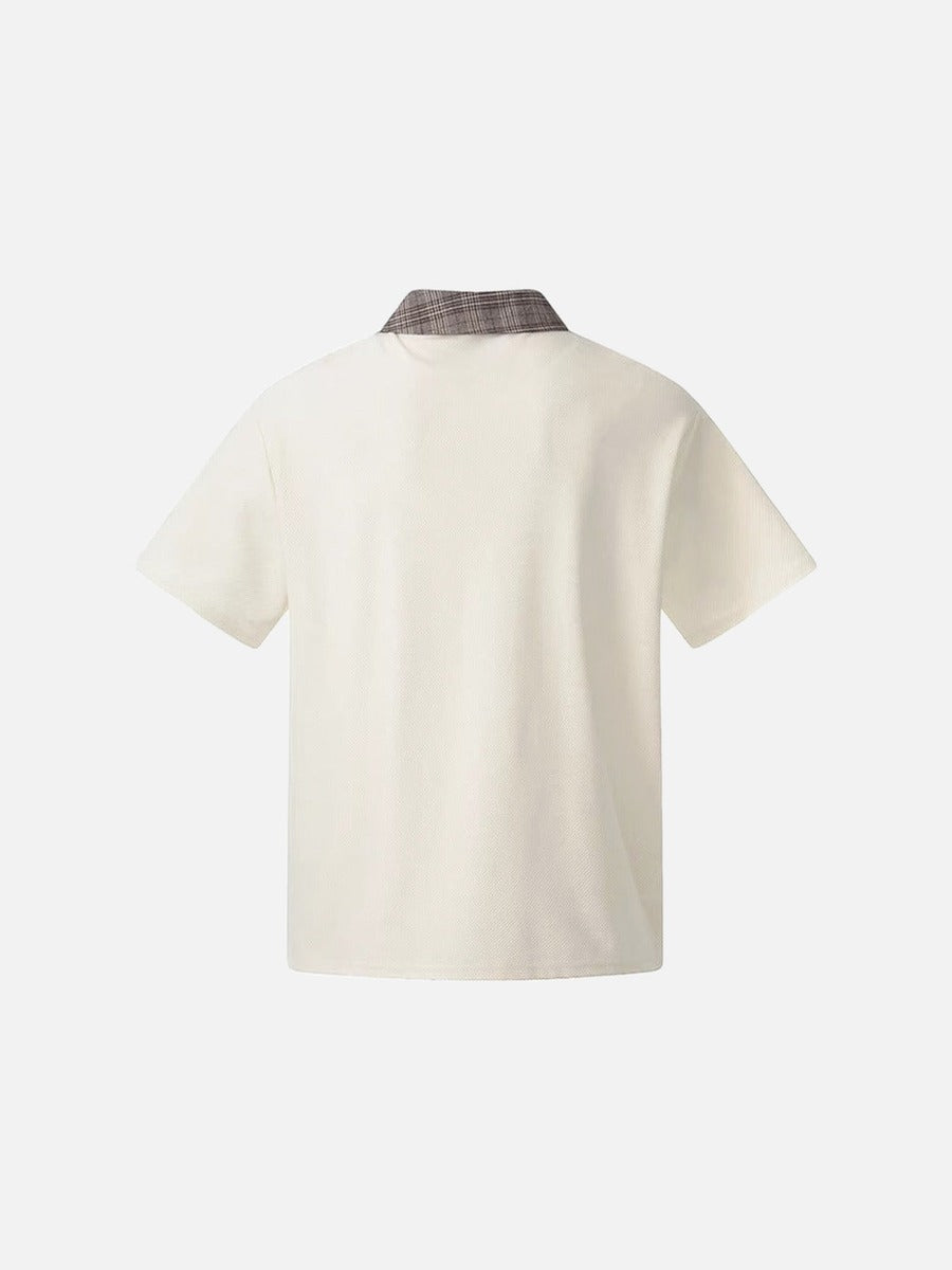 DAXUEN Asymmetrical collar short-sleeve top in cream and black