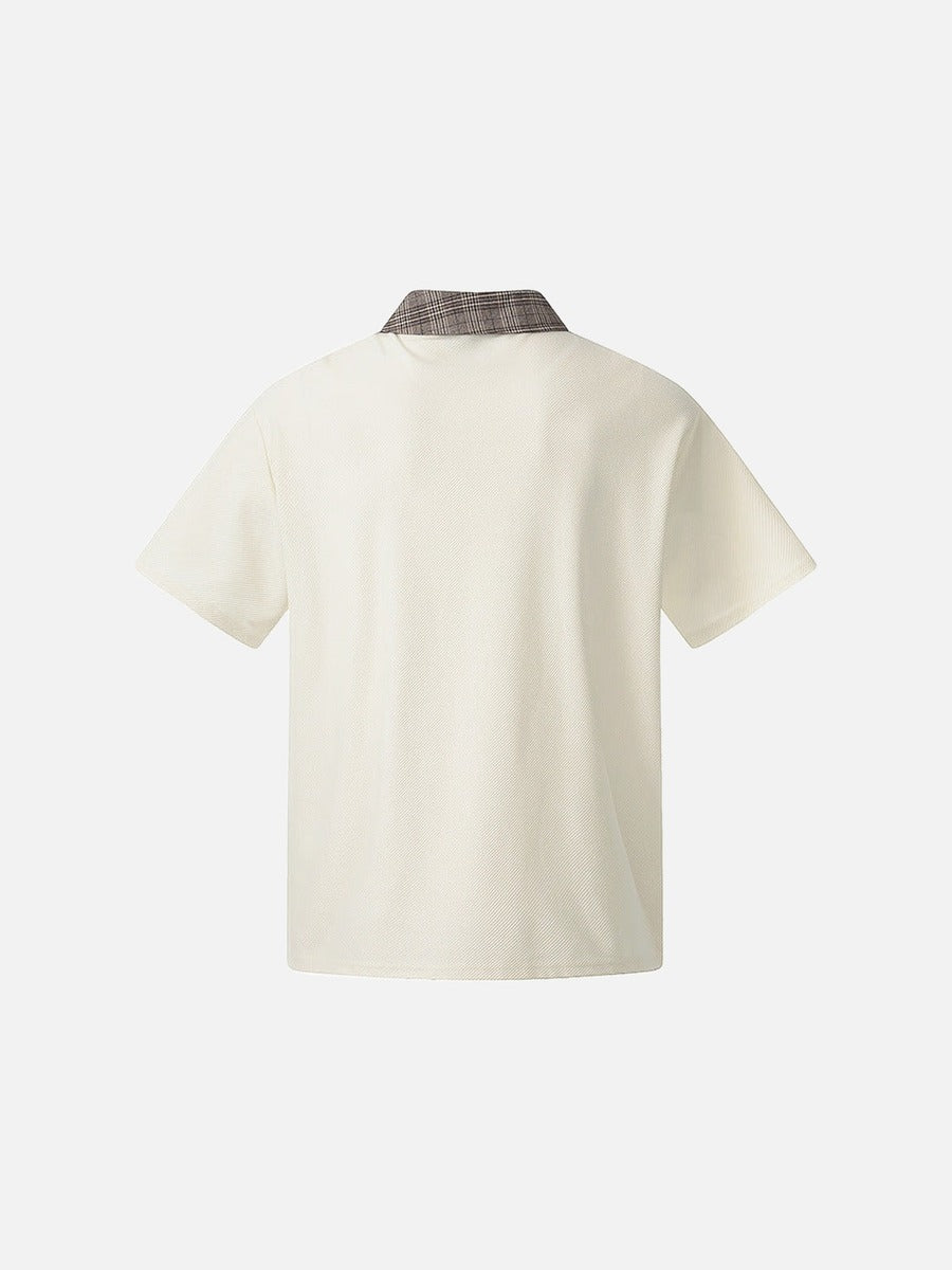 DAXUEN Asymmetrical collar short-sleeve top in cream and black