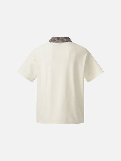DAXUEN Asymmetrical collar short-sleeve top in cream and black