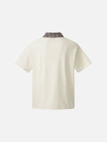 DAXUEN Asymmetrical collar short-sleeve top in cream and black
