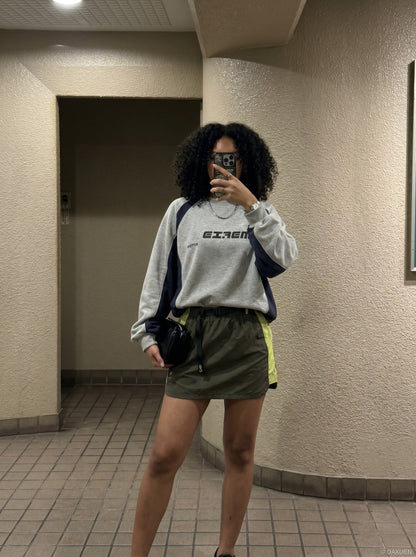DAXUEN asymmetrical color-blocked skort with integrated shorts — model photo