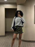 DAXUEN asymmetrical color-blocked skort with integrated shorts — model photo
