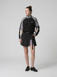 DAXUEN Women's asymmetrical mini skort — model photo