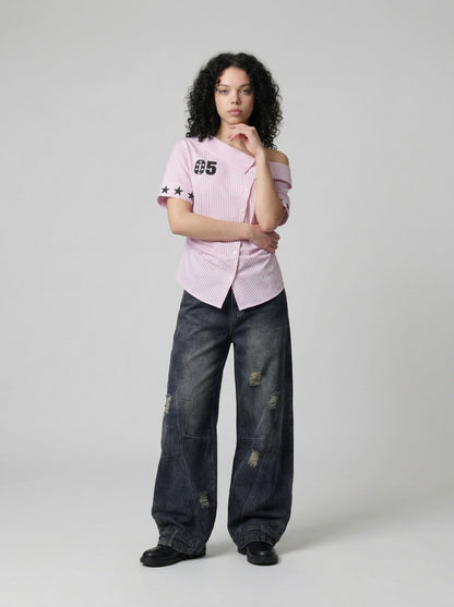 DAXUEN Women's asymmetrical off-shoulder shirt with stripes and graphic — model photo