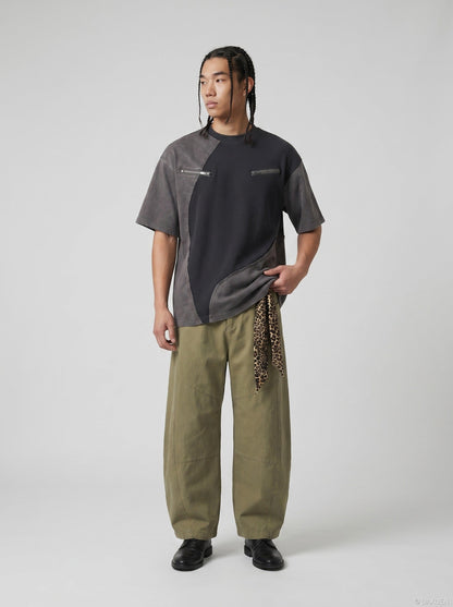 DAXUEN Asymmetrical panel t-shirt in charcoal grey and dark waffle knit — model photo