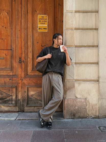 DAXUEN Asymmetrical panel t-shirt in charcoal grey and dark waffle knit — model photo