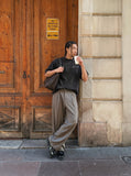 DAXUEN Asymmetrical panel t-shirt in charcoal grey and dark waffle knit — model photo