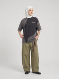 DAXUEN Asymmetrical panel t-shirt in charcoal grey and dark waffle knit — model photo