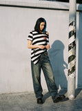 DAXUEN black and white striped asymmetrical graphic t-shirt — model photo
