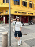 DAXUEN Short-sleeved crew-neck T-shirt with sports jersey style — model photo