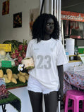 DAXUEN Short-sleeved crew-neck T-shirt with sports jersey style — model photo