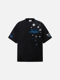 Oversized T-shirt with snowflake and star graphics