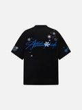 Oversized T-shirt with snowflake and star graphics