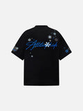 Oversized T-shirt with snowflake and star graphics