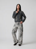 DAXUEN High-waisted wide-leg cargo pants with acid-wash effect — model photo