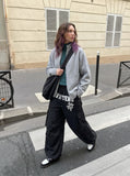 DAXUEN Wide-leg cargo pants with graphic print — model photo
