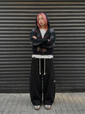 DAXUEN Wide-leg cargo sweatpants with embroidered text — model photo