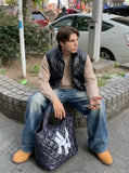 DAXUEN Baggy Denim Jeans with Embroidered Pockets | DAXUEN — model photo