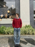 DAXUEN Baggy denim jeans with wide-leg silhouette and raw edge details — model photo