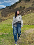 DAXUEN Baggy denim jeans with wide-leg silhouette and raw edge details — model photo