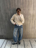 DAXUEN Baggy denim jeans with wide-leg silhouette and raw edge details — model photo
