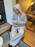 DAXUEN Baggy graphic sweatpants with colorful motifs — model photo