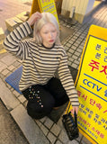DAXUEN Baggy graphic sweatpants with colorful motifs — model photo