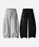 DAXUEN Baggy graphic sweatpants with colorful motifs