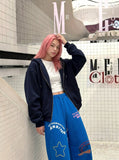 DAXUEN Oversized wide-leg sweatpants with graphic prints — model photo