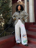 DAXUEN Oversized wide-leg sweatpants with graphic prints — model photo