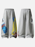 Grey wide-leg sweatpants with patchwork designs