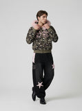 DAXUEN Baggy track pants with star appliqués and elastic waistband — model photo