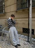 DAXUEN Baggy track pants with star appliqués and elastic waistband — model photo