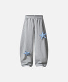 DAXUEN Baggy track pants with star appliqués and elastic waistband