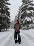 DAXUEN Baggy track pants with star appliqués and elastic waistband — model photo