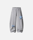 DAXUEN Baggy track pants with star appliqués and elastic waistband