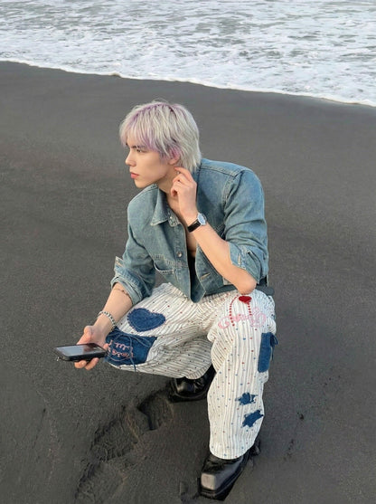DAXUEN Wide-leg striped pants with patches and embroidery — model photo