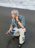 DAXUEN Wide-leg striped pants with patches and embroidery — model photo