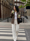 DAXUEN Men's baggy wide-leg pants in dark brown and black — model photo