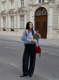 DAXUEN Men's baggy wide-leg pants in dark brown and black — model photo